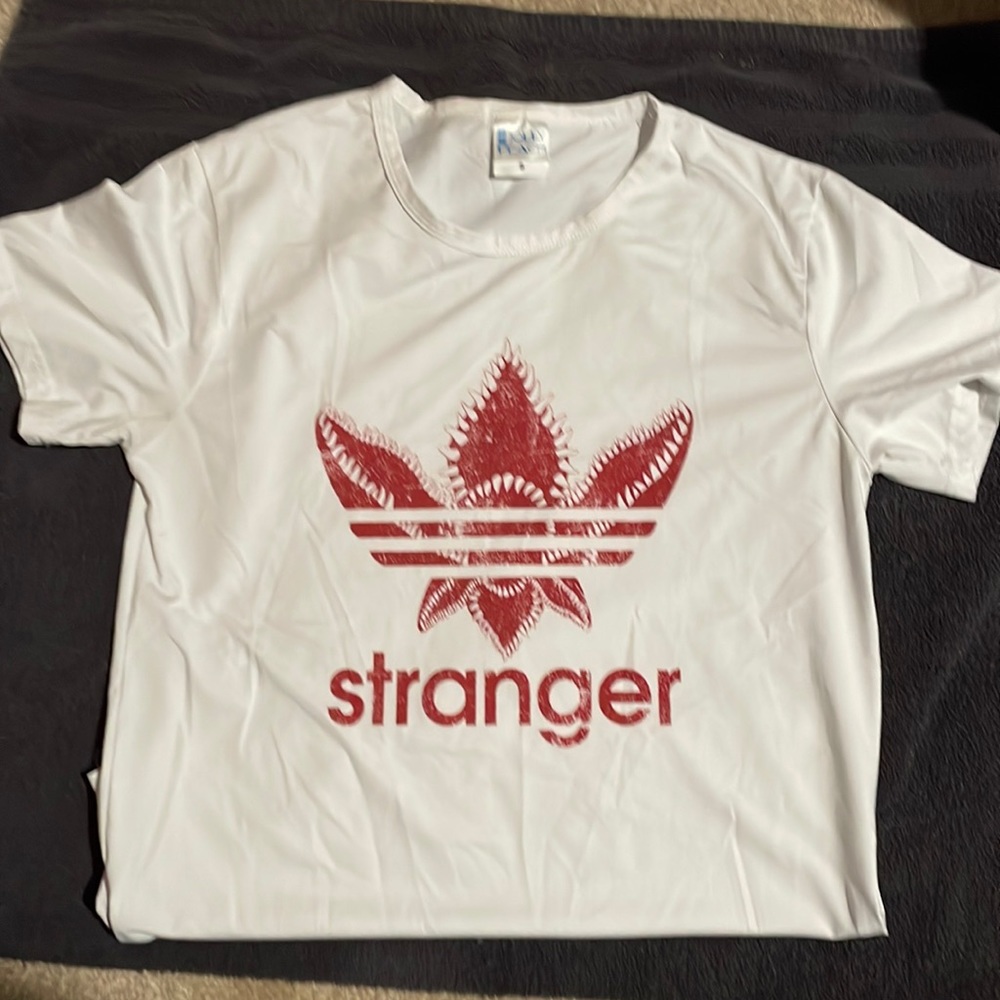 White Stranger Things shirt. Size S. Wore it 2x. In good condition.